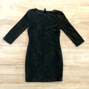 Black dress, gold detail